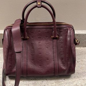 Authentic slightly used Leather MCM Top Handle speedy bag size medium.
